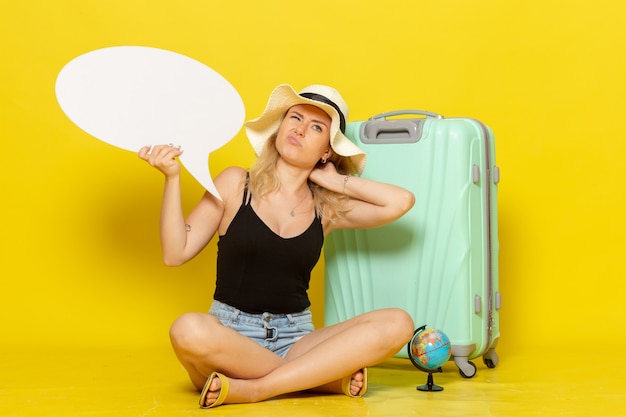 Front view young female holding big white speech bubble