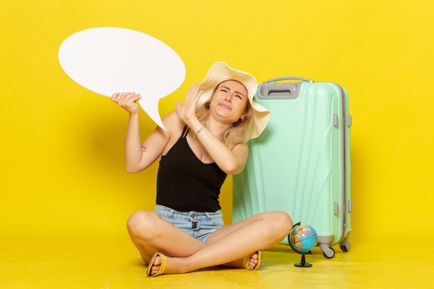 Front view young female holding big white speech bubble