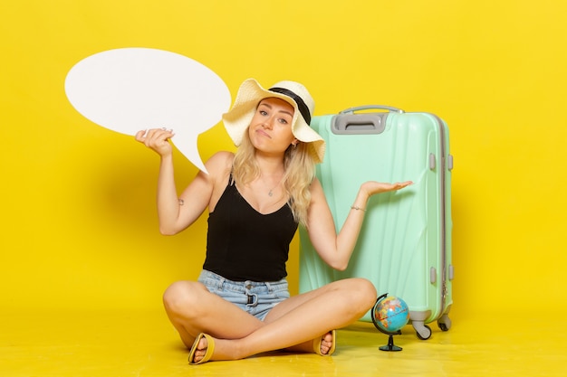 Front view young female holding big white speech bubble