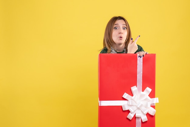 Free photo front view young female inside present box