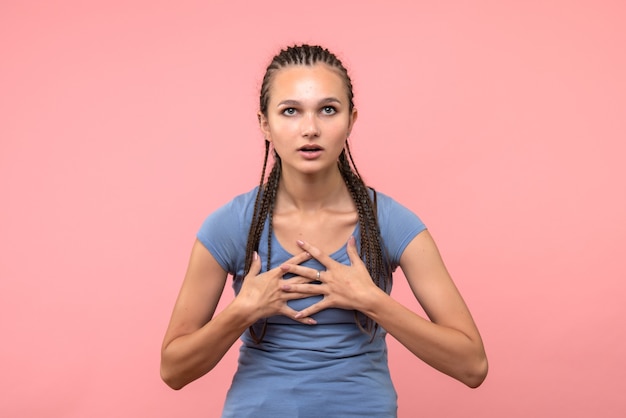 Free photo front view of young female on pink