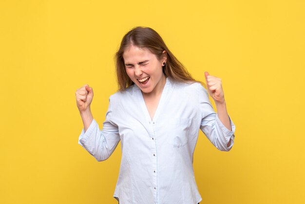 Front view of young female rejoicing