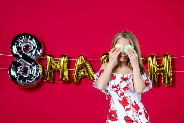 Free photo front view young female removing with sponges on decorated red lips