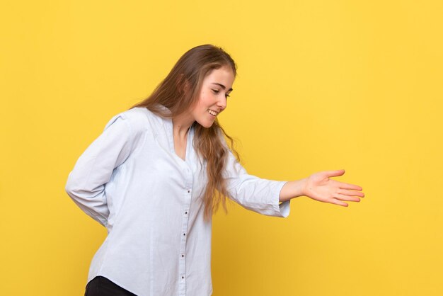 Front view of young female shaking hands