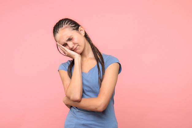 Free photo front view of young female stressed on pink