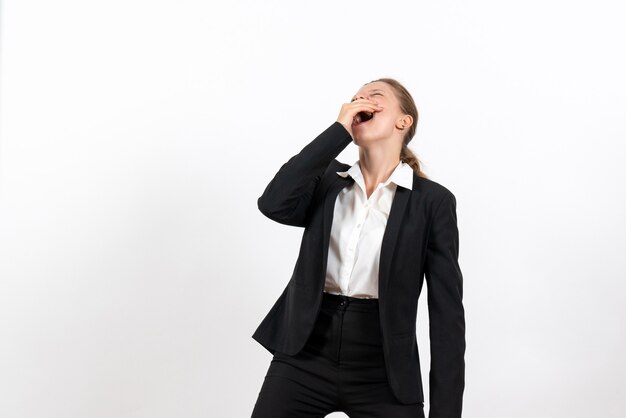 Front view young female in strict classic suit laughing on white background woman business suit work job female