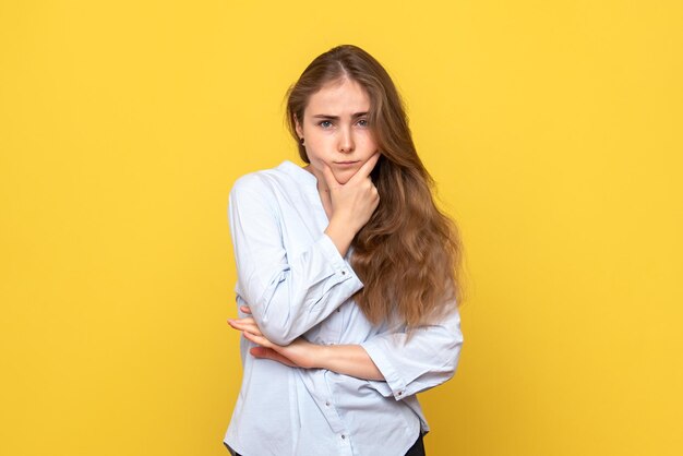 Front view of young female thinking