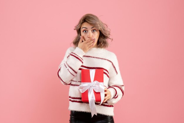 Front view young female with xmas present