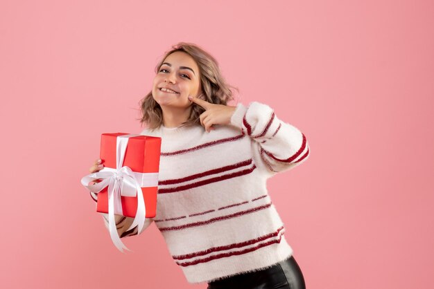 Front view young female with xmas present