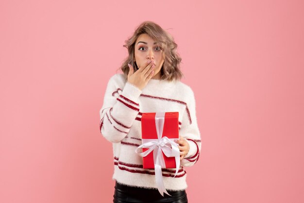 Front view young female with xmas present