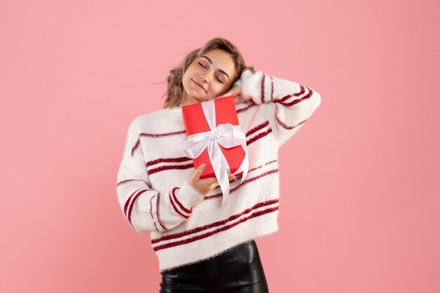 Front view young female with xmas present