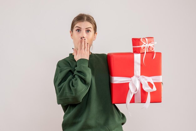 Front view young female with xmas presents