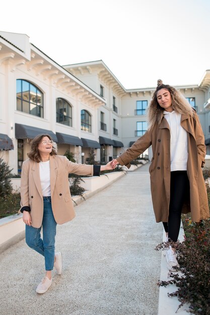 Front view young girls posing together