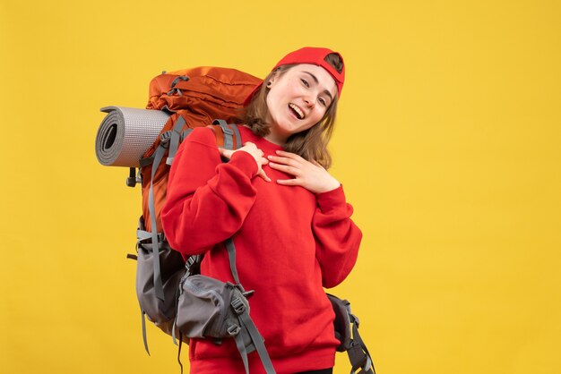 Front view young happy tourist with backpack