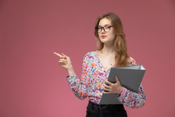 Free Photo front view young lady showing right side with her document