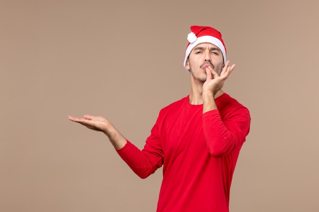 Front view young male on brown floor christmas holidays emotions