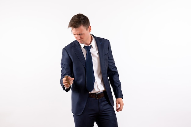 Front view young male standing in classic suit on white background