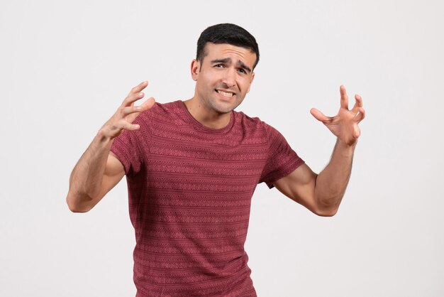 Front view young male wearing t-shirt and standing on white background