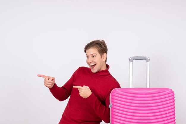 Front view young male with pink bag on white background