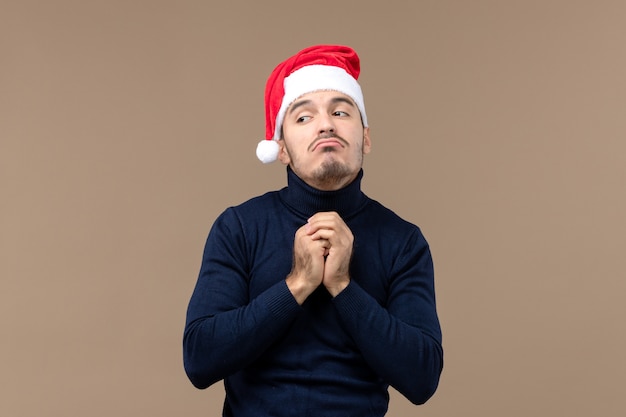 Free photo front view young male with sad expression, emotions christmas holiday