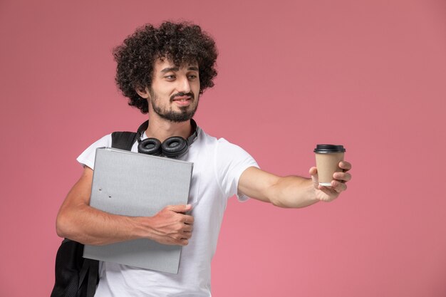 Front view young man offering coffee to his friend