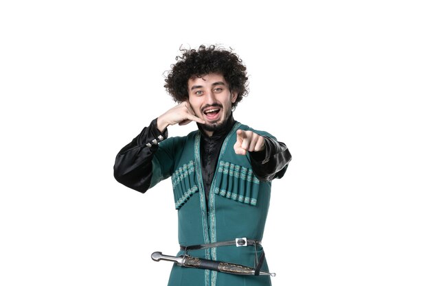 Front view of young man in traditional azerbaijani costume on white background colours novruz ethnicity spring performers dancer concept horizontal