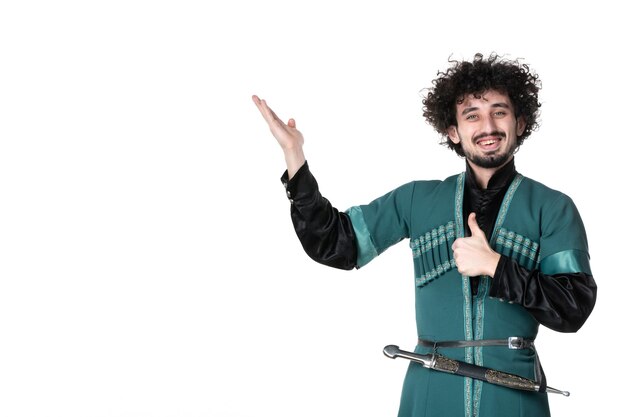 Front view of young man in traditional azerbaijani costume on white background novruz horizontal colours spring ethnicity concept dancer performers