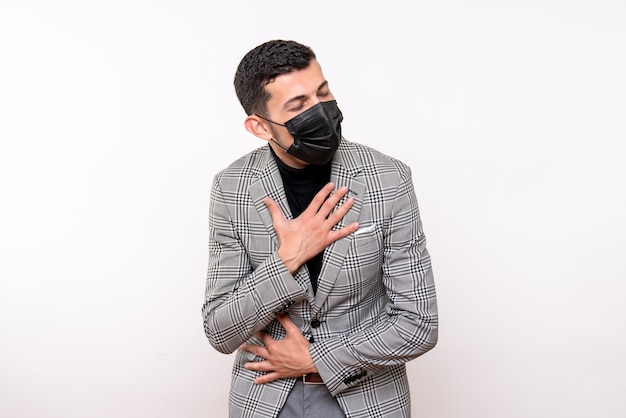 Front view young man with black mask putting hands on chest standing on white isolated background