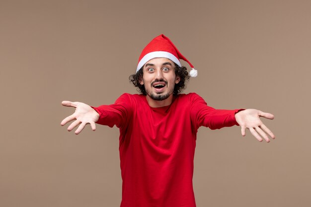 High-Quality Free Stock Photos: Front View Young Man Expressing Excitement during the Christmas Holidays