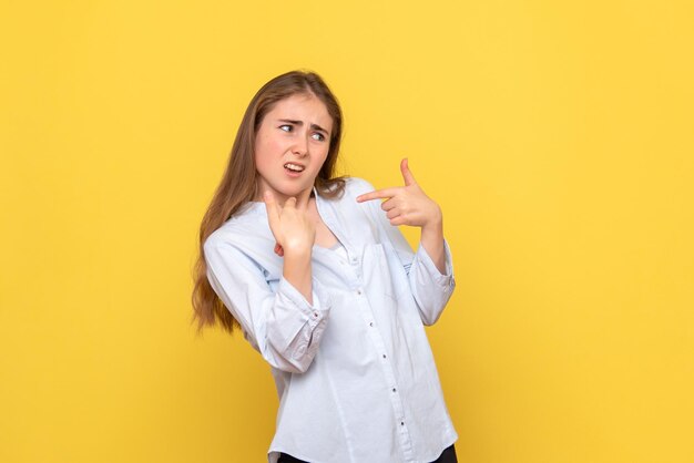 Front view of young woman displeased