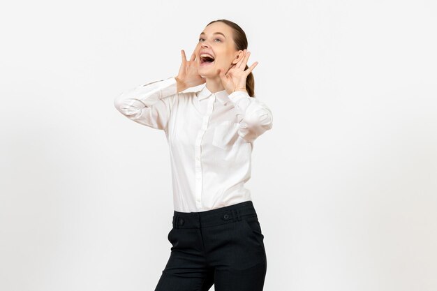 Front view young woman in elegant white blouse laughing on white background woman office job lady female worker