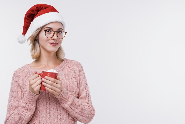 Front view young woman holding a mug