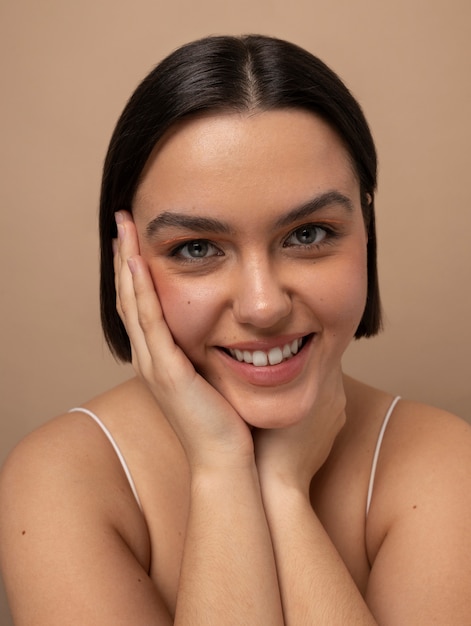 Front view young woman posing in studio