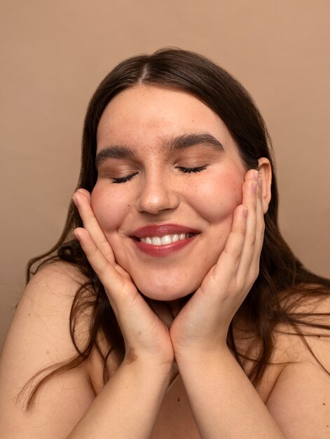 Front view young woman posing in studio