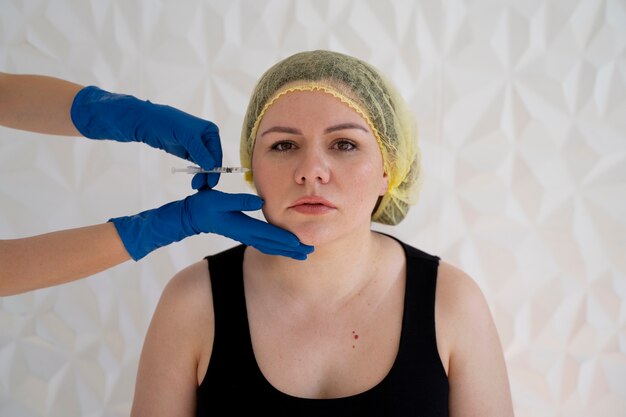 Front view young woman wearing cap