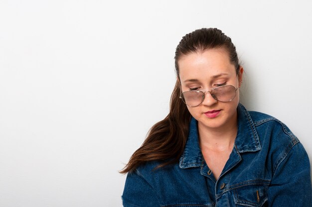 Front view young woman wearing glasses