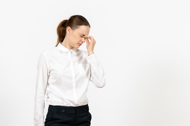 Front view young woman in white blouse having headache on a white background job female feeling model emotion office