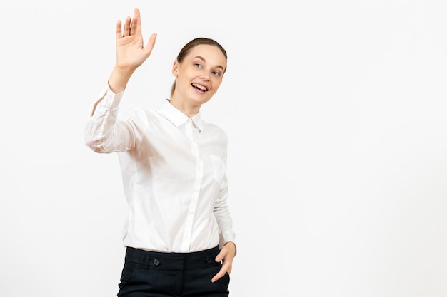 Front view young woman in white blouse with excited expression on white background female model office emotion job feeling