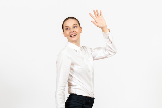 Front view young woman in white blouse with excited expression on white background female model office emotions job feeling