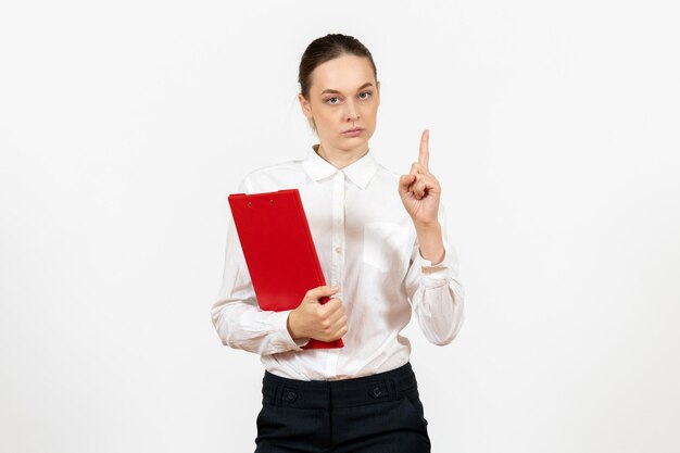 Front view young woman in white blouse with red file on white background office female emotion feeling model job