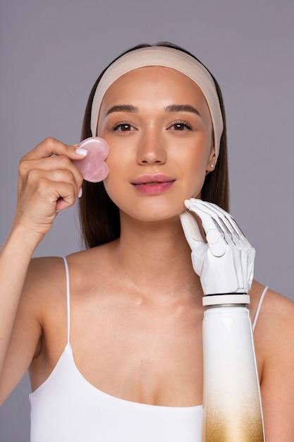 Free photo front view young woman with prosthetis