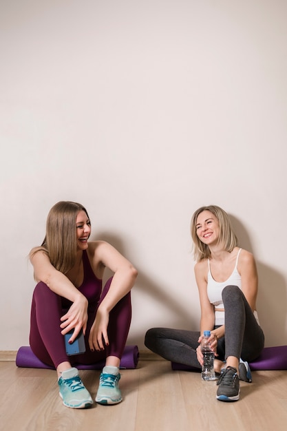 Front view young women taking a break