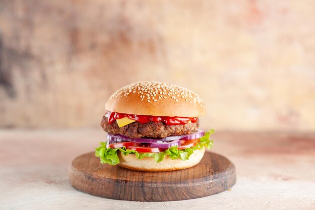 Front view yummy meat cheeseburger on cutting board light background salad dinner snack fast-food sandwich dish