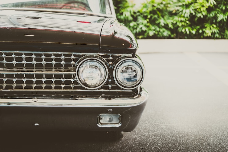 Free Photo front vintage chrome headlight auto