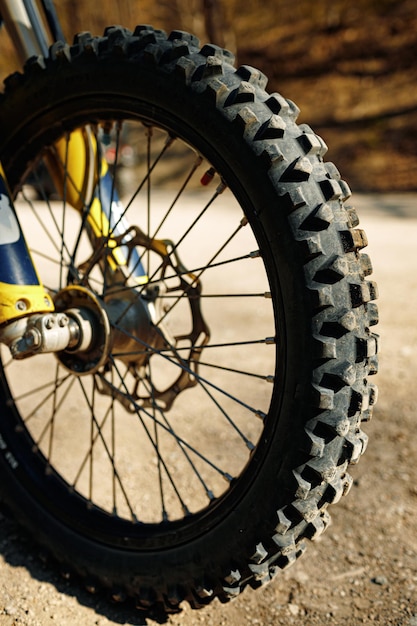 Free photo the front wheel of motocross close up