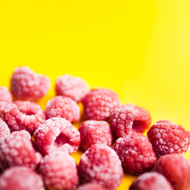 Free photo frozen berries of raspberries