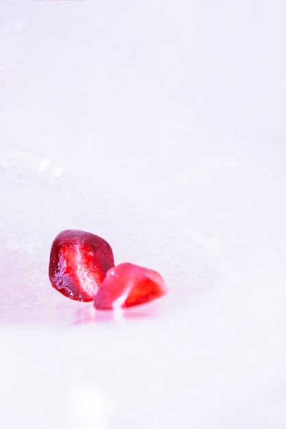 Free photo frozen pomegranate seeds