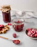 Free photo frozen raspberries jam high view