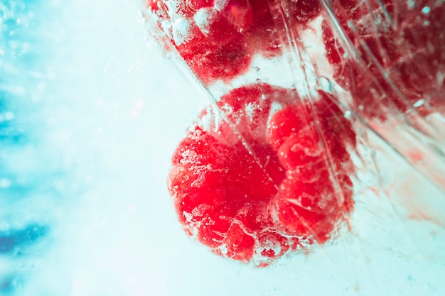 Free photo frozen raspberries