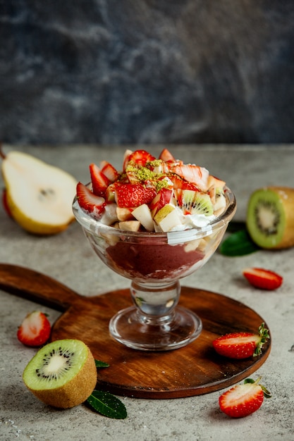 Fruit bowl with chocolate and cream mousse